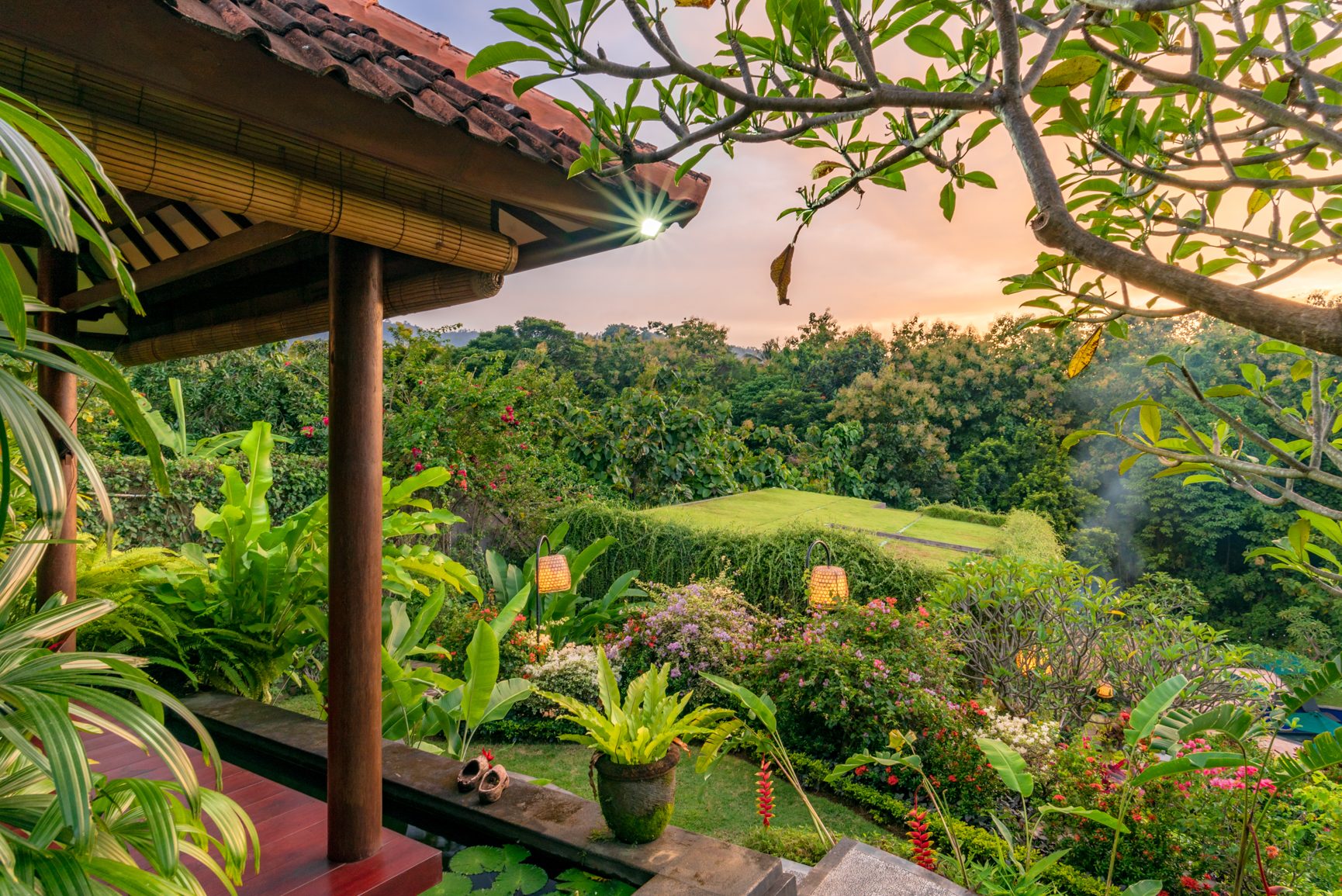 Sunset seen from an Alamanda pavilion over the North Bali valley
