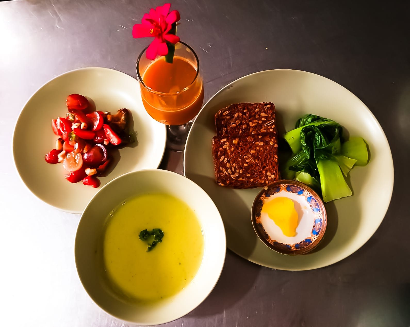 Close-up of a colourful plated dish with fresh tropical ingredients