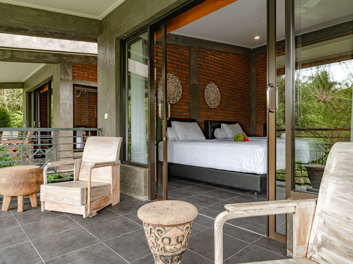 Poolside Jungle Room Baloo at Alamanda with air conditioning and a private terrace